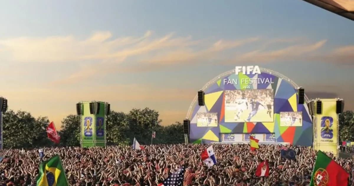 Outdoor football fan festival watch party with supporters and large screens